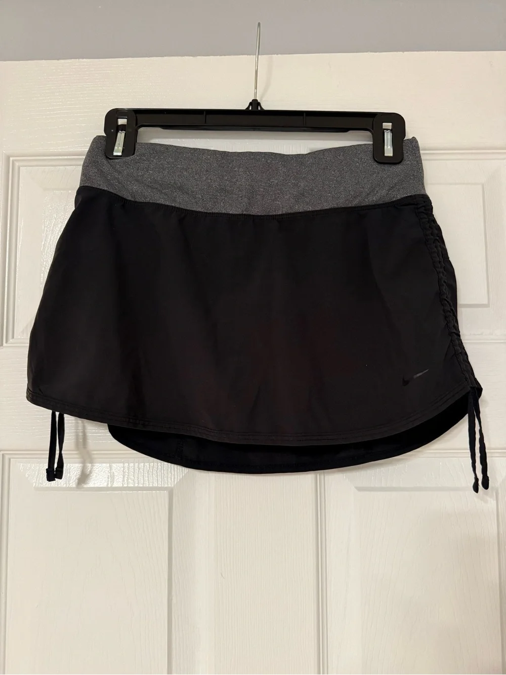 Two Nike Black Tennis Skirts 1 with Gray Waistband